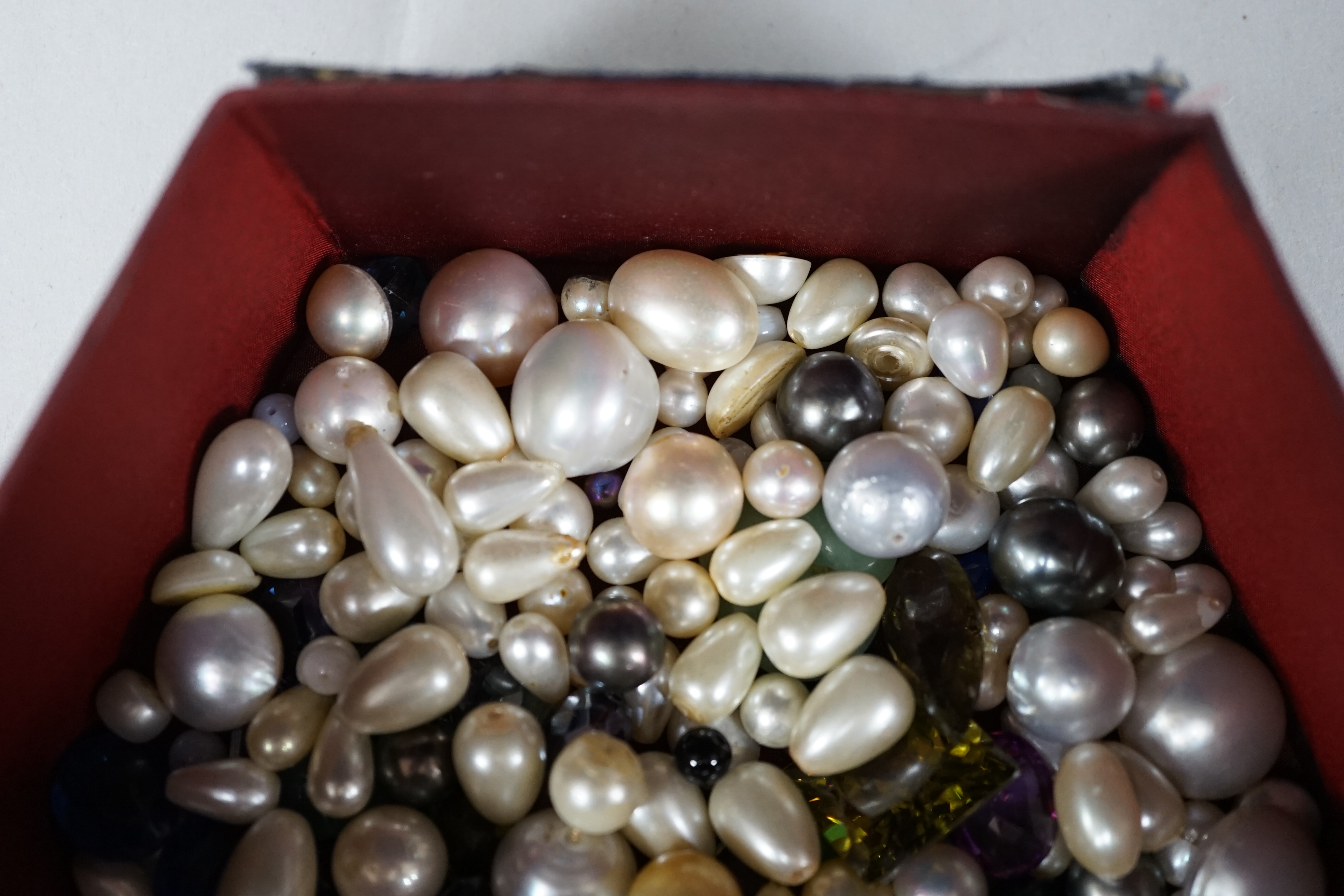 A small collection of assorted unmounted stones and paste. Condition - poor to fair